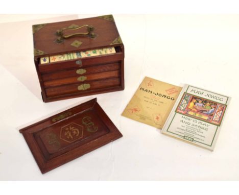 Boxed Mah Jong set in wooden box with brass corners and handles, together with a Mah Jong "Rules of the Game" by Chad Valley 