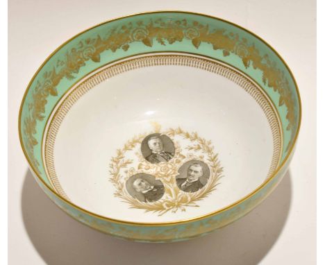 Copeland Spode bowl, the interior with photographs of the Chamberlain family within a green and gilt border, the base with in