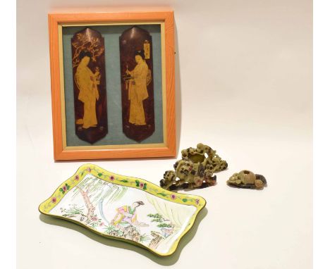 Group of Oriental wares comprising two soapstone carvings, an enamel tray with figures and two framed door plaques, again dec