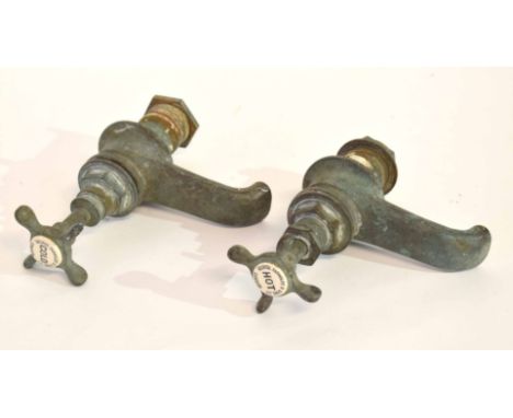 Pair of late 19th century brass taps, the ceramic insert by George Farmiloe &amp; Sons, London, 20cm long