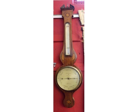 19th century wheel barometer, the wooden case with shell inlay, the dial manufactured by D Langston, Cheapside, the wooden ca