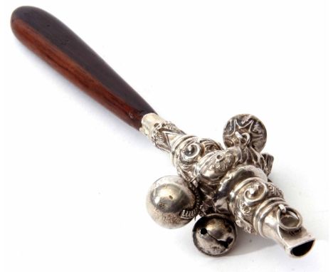 Late Victorian combination rattle of baluster form fitted with a whistle and ring suspension and four bells (one replacement)