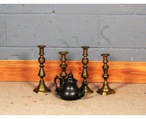 Two pairs of brass candlesticks with dished sconces and knopped stems, pewter teapot (5)
