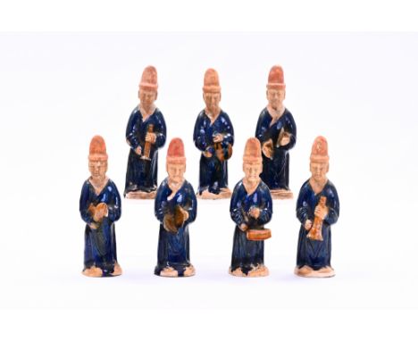 Seven Chinese partly blue-glazed pottery sculptures of musicians, probably MingH ca.: 20 cm