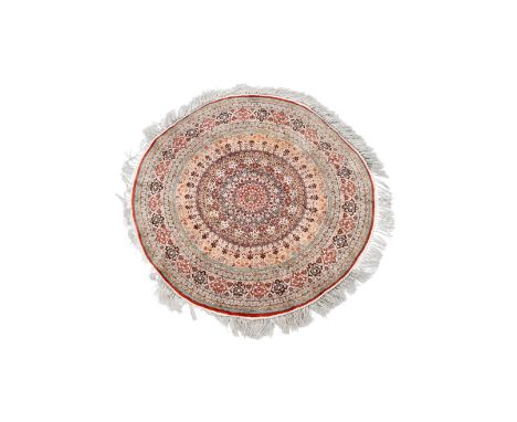 A round Chinese silk carpet in oriental style with floral design, 20th C.Dia.: 120 cm