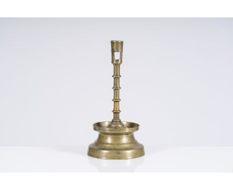 A Flemish bronze knotted candlestick, 16th C.H 26 cm  Provenance: - A fine Belgian private collection.