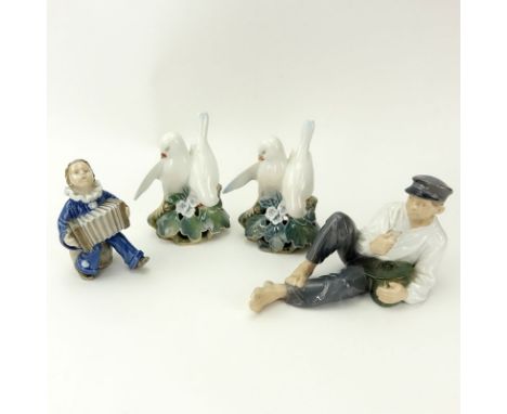 Collection of Four (4) Royal Copenhagen Figurines. Includes: 2 Lovebirds #402 5-1/2" H, one with flake on wing tip; Boy With 