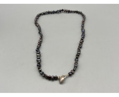 Blister pearl necklace with heart catch