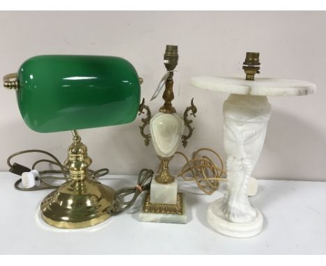 Two marble table lamps together with a brass banker's desk lamp