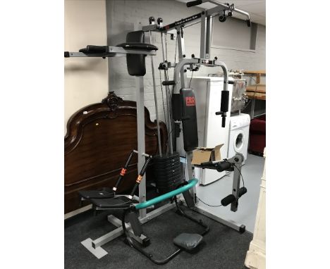 A pro-power multi gym and an ab roller 