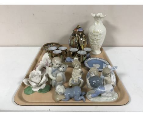 A tray of Belleek vase, miniature oriental eggshell tea service, Spanish figures, Wedgwood dish etc