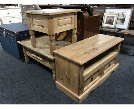 A pine entertainment unit, pine coffee table and matching lamp table 