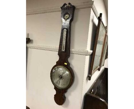 A Victorian mahogany barometer with silvered dial 