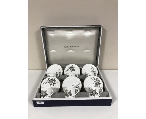 A boxed Royal Worcester twelve piece coffee set