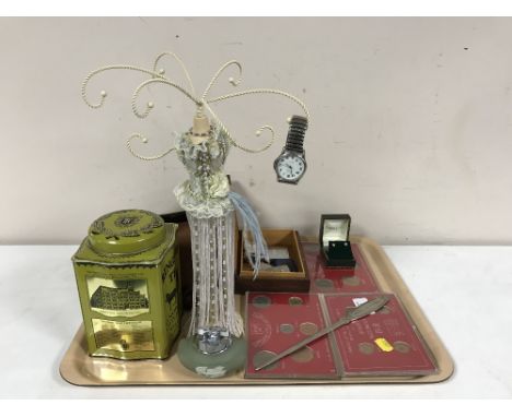 A tray of Ringtons tin, boxed Brownie camera, wooden jewellery box of lighters, table lighters, three Coinage of Great Britai