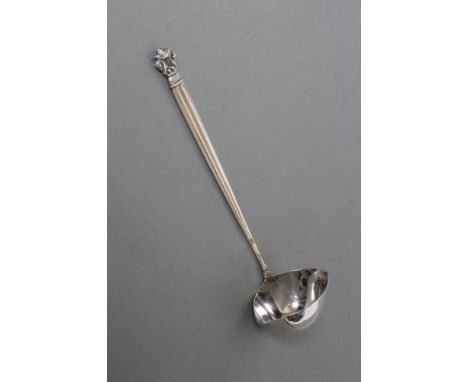 AN ART DECO SAUCE SILVER LADLE, maker Georg Jensen, London import marks 1925, in "Acorn" pattern with double lipped bowl, 6 3