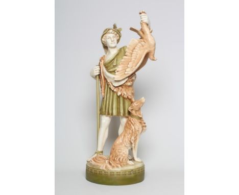 A LARGE ROYAL DUX HUNTER, 20th century, the young man holding aloft an eagle in his left hand and leaning on a stick, his dog