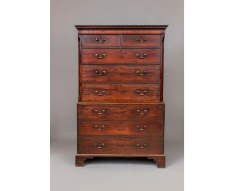 A GEORGIAN MAHOGANY CHEST ON CHEST, third quarter 18th century, the moulded cornice over two short and three long drawers wit