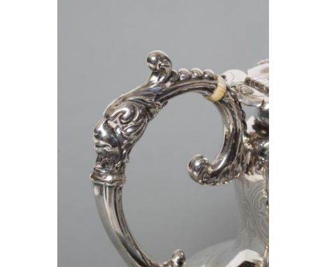 AN EARLY VICTORIAN SILVER FOUR PIECE TEA AND COFFEE SERVICE, maker George Angell, London 1855, of baluster form with an engra