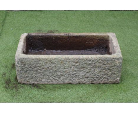 A SANDSTONE TROUGH of fine cut oblong form, 33" x 17 3/4" x 10" (Est. plus 21% premium inc. VAT)Very good, no chips/losses/cr
