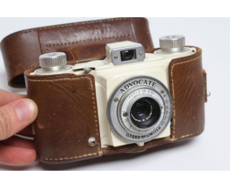 AN ADVOCATE CREAM CASED CAMERA, Ilford Ltd lens Dallmeyer Anistagmat F=35mm F/3.5, in stitched leather carrying case (Est. pl