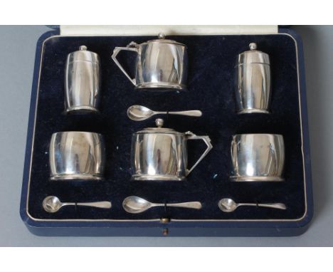 AN ART DECO SILVER SIX PIECE CRUET, maker Mappin & Webb, Birmingham 1934, of plain slightly bombe cylindrical form, comprisin