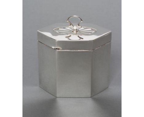A SILVER TEA CADDY, maker Thomas Bradbury & Sons, London 1912, of hexagonal form, the hinged cover with chased batswing pater