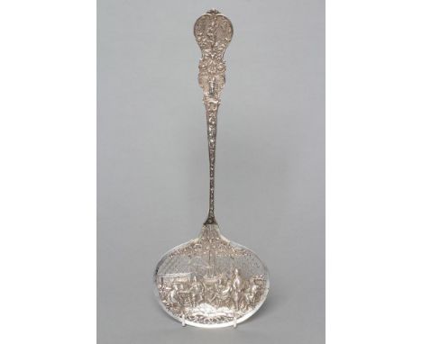 A DUTCH SILVER PRESENTATION SPOON, 833 standard, (1893?), the large oval bowl chased and pierced with figures seated and stan