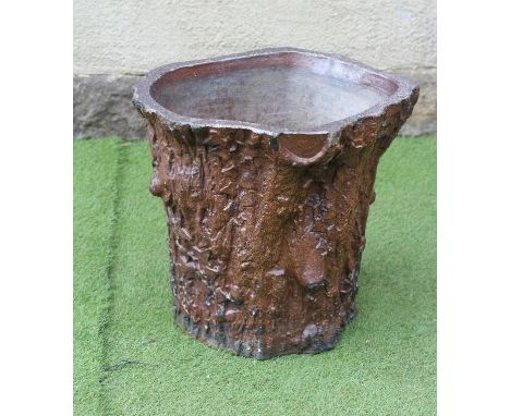 A VICTORIAN SALT GLAZED JARDINIERE STAND naturalistically modelled as an ivy clad tree trunk with mildly flared base, 15 3/4"
