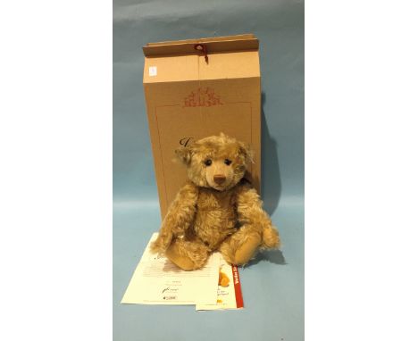 Steiff, a modern Steiff Year 2000 teddy bear, blonde mohair with button in ear and tag, certificate no. 06903 of Ltd Edn, 40c