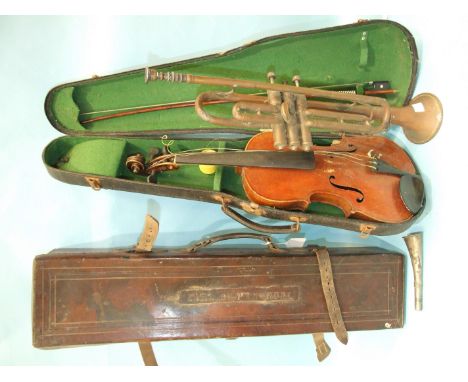 A full-sized violin in case, with bow, A Pan American Elkhart Ind, USA trumpet, an Acme keeper's horn, a leather gun case and