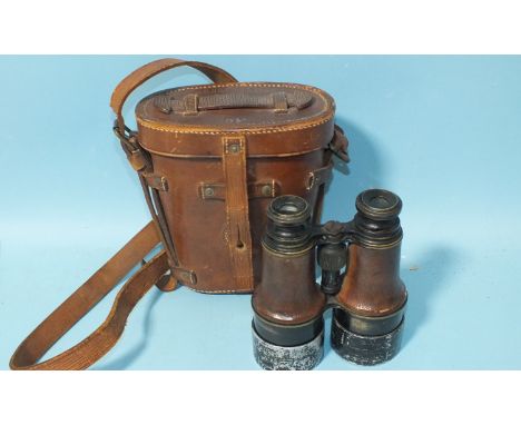 A pair of leather-cased WWI pattern service binoculars, the case marked J Brooks &amp; Co. Ltd, 1916, 2½", with 'cross foot' 