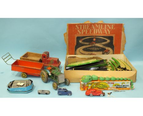 A Schuco 1001 red saloon, a Dinky 34c loudspeaker van, a Triang c/w Loch Ness Monster, boxed, (n/w), a Mettoy tinplate tracto