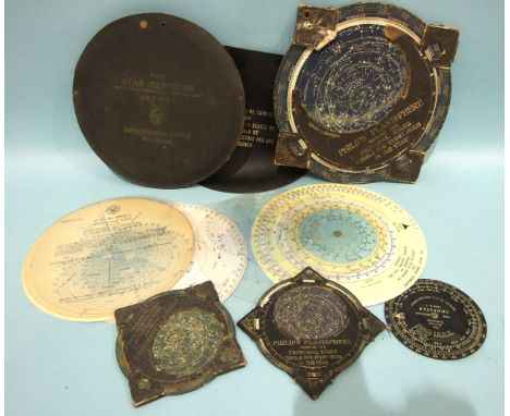 A Philips Planisphere, 32cm (damaged), two smaller Philips Planispheres, 17cm, a Hydrographic Office Rude Star Identifier and