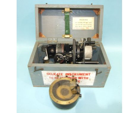 An AM Astro Compass MkII 6A/1174 2/H, in fitted case and a military issue type O6A hand-held prismatic compass with brass bez