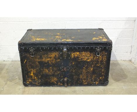 A 'leather'-covered studded and bound packing trunk, the lined interior labelled Asnièrs, Louis Vuitton Paris, 92cm wide, 52c