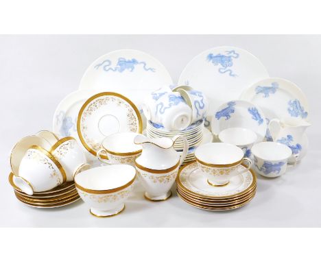 A Wedgwood part service, to include serving plates, decorated with dragons, 28cm dia., jug, plates, saucers, cups, etc, Portl