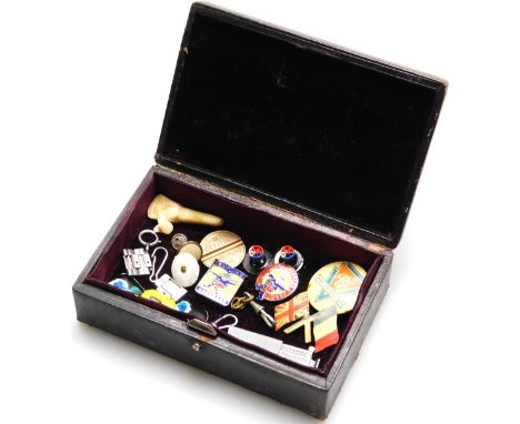 Two vintage enamel Butlin's badges, for 1962 and 1965, 3cm H, various other badges, etc, in a partially fitted case. (a quant