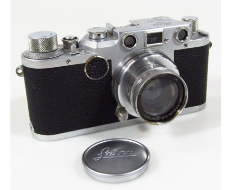 A Leica DRP Wetzlar camera, no. 447447, with Leitz lens, F:5cm 1:2, numbered 237221, 13cm W.