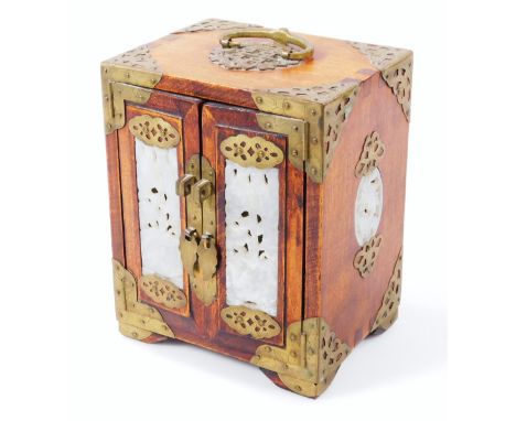 A Chinese table top jewellery cabinet, of rectangular outline, with pierced metal spandrels and jade finished front doors, hi