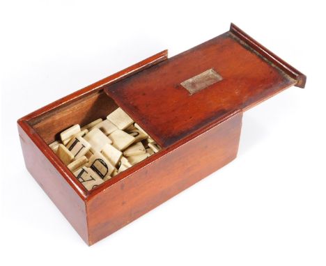 A quantity of 19thC bone children's learning alphabet letters, of rectangular outline, 2cm x 1cm, etc., contained in a 19thC 