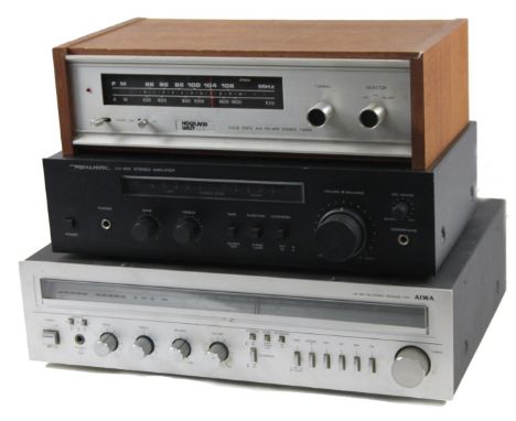 A Howland West wooden cased AM/FM MPX stereo tuner, with front articulated knops, 37cm W, a realistic SA-900 stereo amplifier