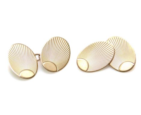 A pair of 9ct gold cufflinks, of oval outline, partially engine turned, with chain centres, 1cm H, 5g. 
