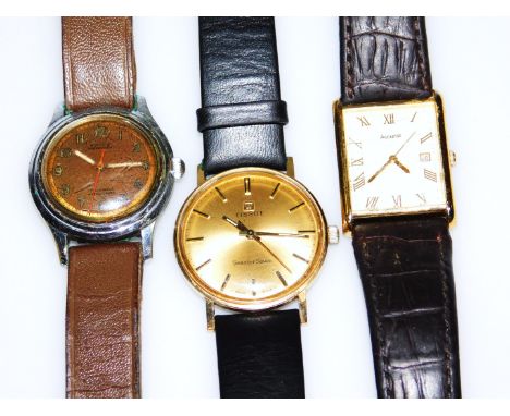 Three gent's wristwatches, to include a Royce wristwatch, with brown dial, a Tissot gent's watch, and an Accurist watch. (3)