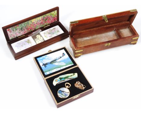 A late 20thC RAF related pocket watch, 6cm H, pen knife and chain set, in fitted case, Andre Norry playing card set and a fur