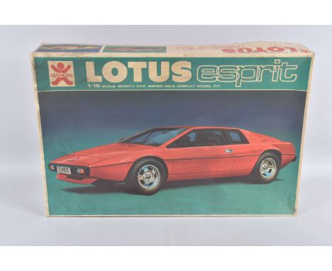 A 1:16 SCALE BANDAI LOTUS ESPTIT UNBUILT KIT, sporty car series no. 3, numbered 8024, model appears complete with parts in se