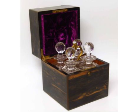 19th century four bottle cut glass decanter set by F. West, one Saint James Street, London in coromandel wood box with brass 
