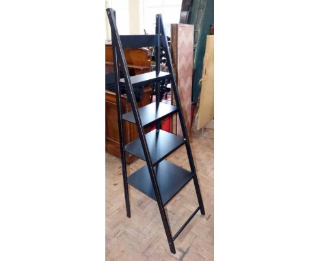 Modern black and gold graduated ladder display shelf. Condition report: see terms and conditions.