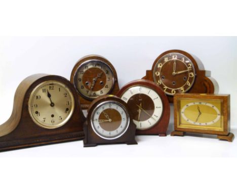 1930's mantel clock, three train movement, walnut Art Deco case and five other clocks. Condition report: see terms and condit