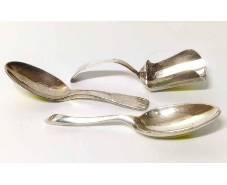 Three silver caddy spoons to include a George III example. Condition report: see terms and conditions.